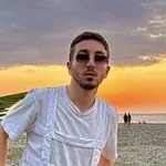 Николай